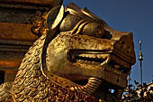 Bagan Myanmar. Shwezigon pagoda. Double bodied lions guard the corners of the pagoda. 